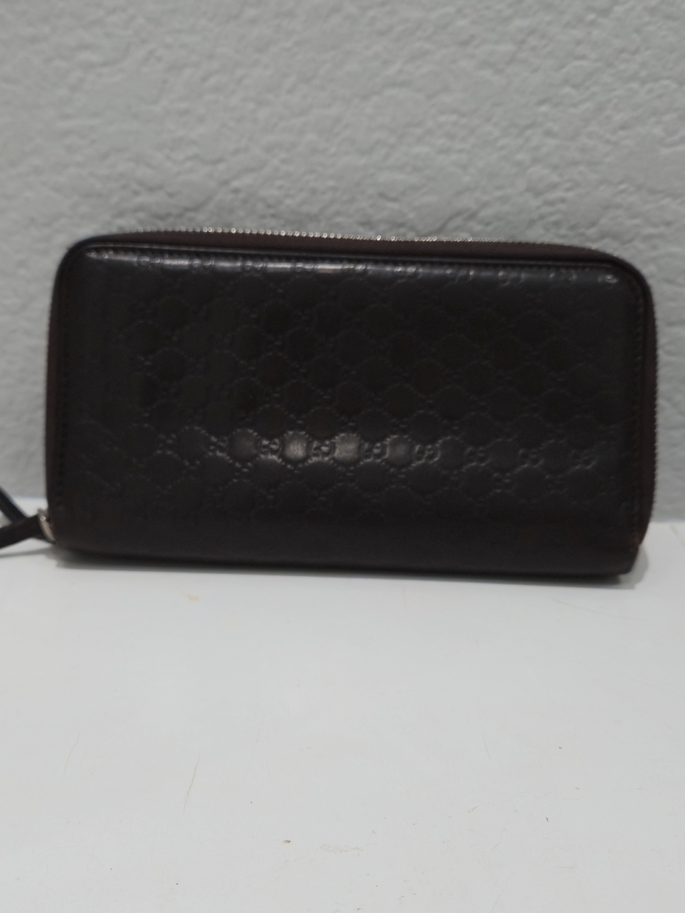 Guccisima Embossed Monogram Zip Around Wallet - Dark Brown